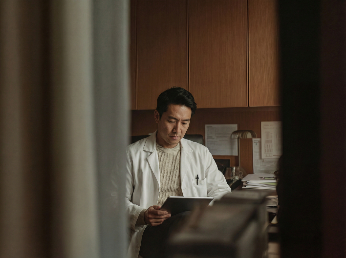Physician reviewing patient results on tablet